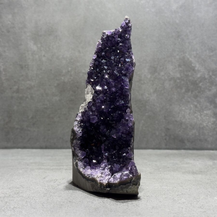 Standing Amethyst Clusters in a bathroom