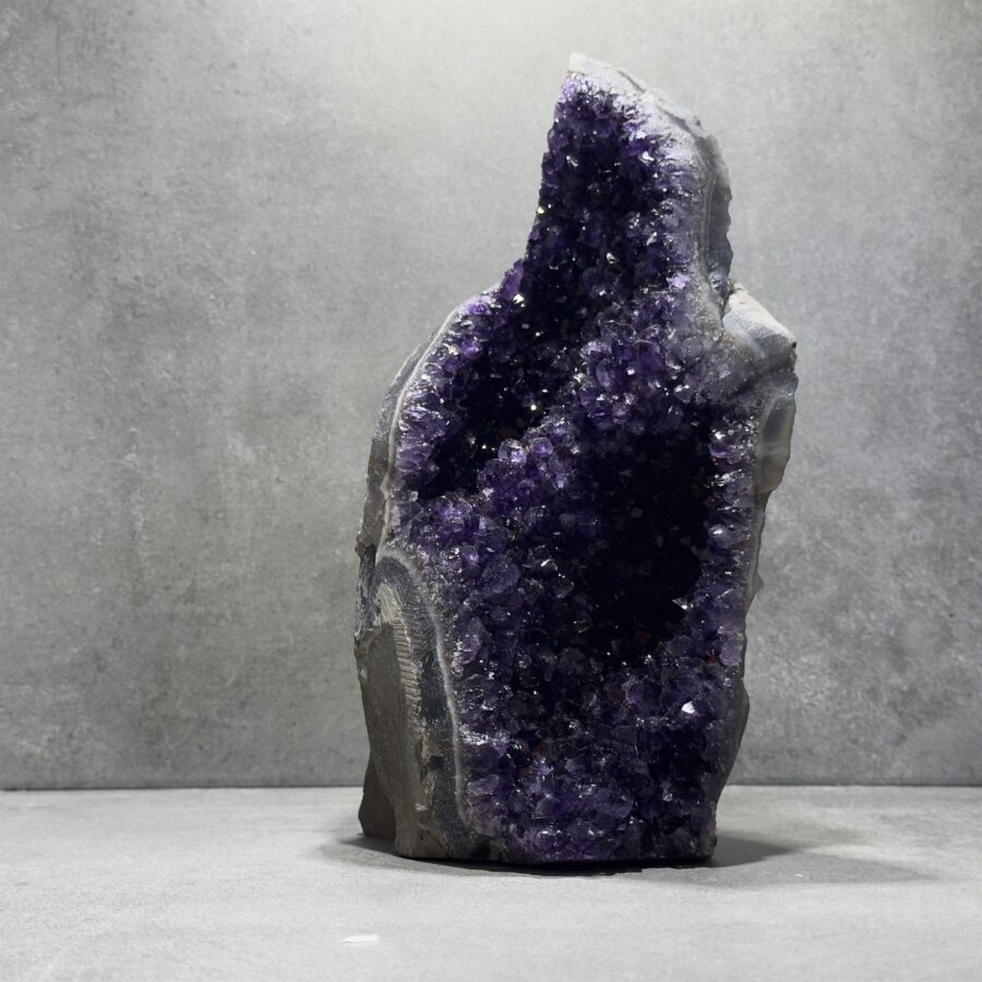 Standing Amethyst Clusters in a bathroom