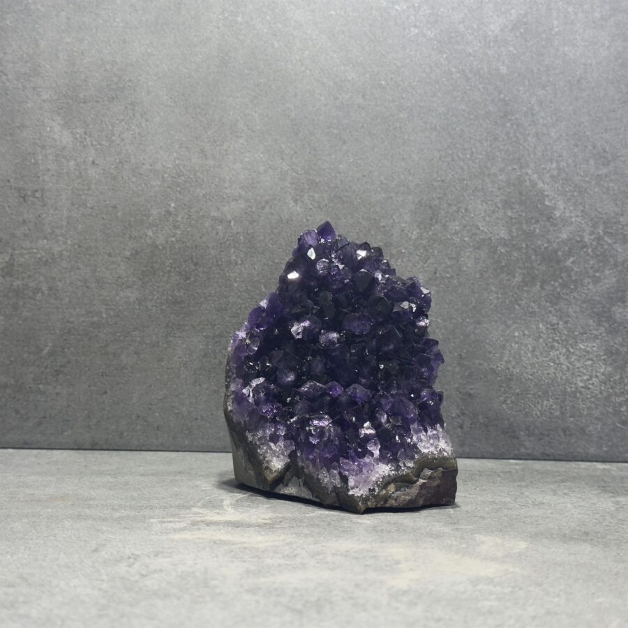 Standing Amethyst Clusters in a bathroom