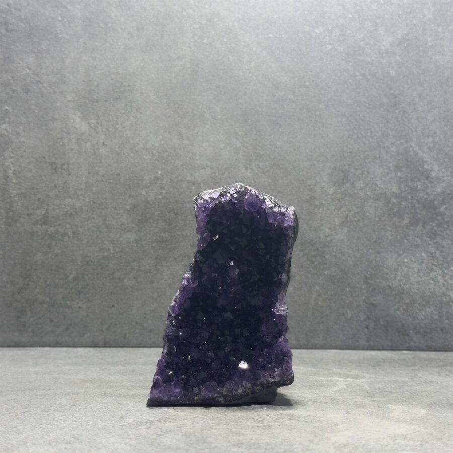 Standing Amethyst Clusters in a bathroom