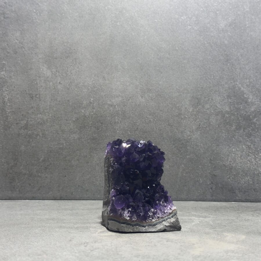 Standing Amethyst Clusters in a bathroom