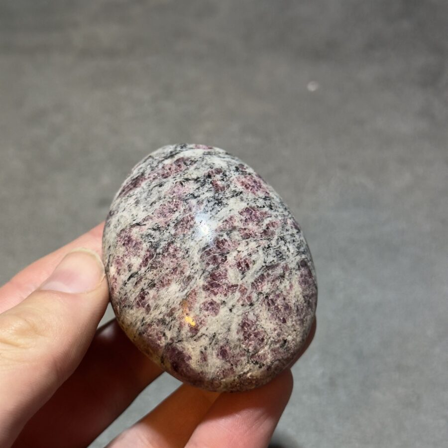 Pink tourmaline on quartz stone